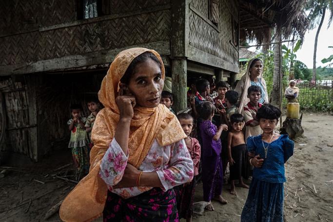 This photo taken on July 13, 2017 shows a Muslim family at Maung Hnama village, Buthidaung township in Myanmar's northern Rakhine state. Photo: Hla Hla Htay/AFP
