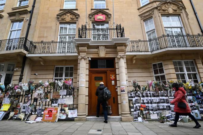 An embassy staff enters the Myanmar embassy in London, Britain, 08 April 2021. Photo: EPA