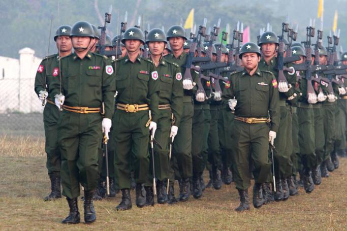 Myanmar armed forces march during a military parade to mark the country's 67th Union Day ceremony in Sittwe, Rakhine State, western Myanmar, 12 February 2014. Photo: EPA
