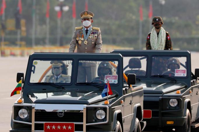 Myanmar military Commander-in-Chief Senior General Min Aung Hlaing (L) participates in a parade during the 77th Armed Forces Day in Naypyidaw, Myanmar, 27 March 2022. EPA-EFE/NYEIN CHAN NAING