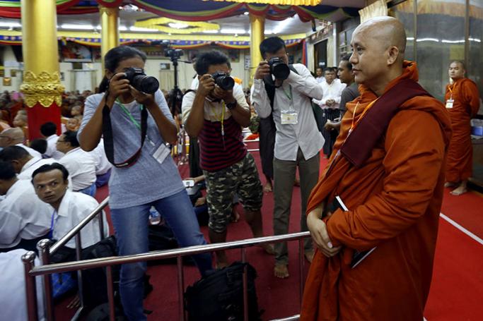 Myanmar Buddhist monk U Wirathu (R), leader of the Ma Ba Tha (969 movement), arrives at the Peace Organization of Ma Ba Tha (Patriotic Association of Myanmar) members conference in Yangon, Myanmar, 27 May 2017. Photo: Nyein Chan Naing/EPA
