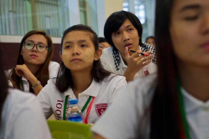 (File) Myanmar business school students attending a briefing at the Yangon Stock Exchange, housed in a historic building in Yangon. Photo: Romeo Gacad/AFP
