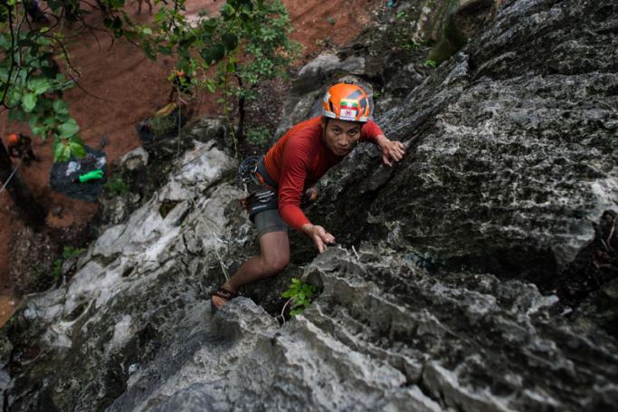 This photo taken on June 9, 2018 shows Myanmar climber Pyae Phyo Aung climbing a route up the wall during training at Bayin Nyi cave inHpa-an, Karen state, in preparation for an expedition to Hkakabo Razi on the northern tip of Myanmar near the border with China and India. Photo: Ye Aung Thu/AFP