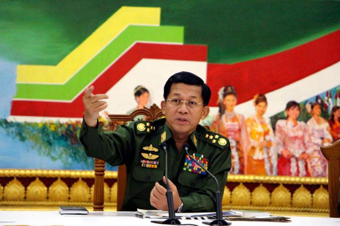 Senior General Min Aung Hlaing, commander in chief of the Myanmar Army talks during the meeting with journalists at Commander in Chief office in Naypyitaw, Myanmar, 21 September 2015. Photo: EPA
