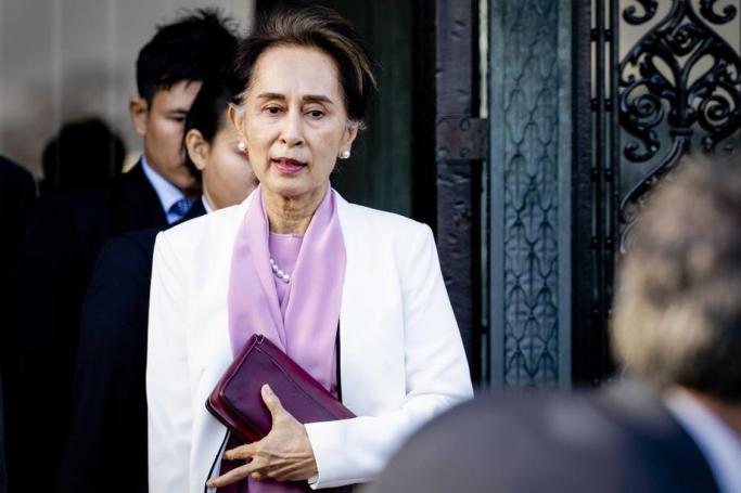 Myanmar State Counselor Aung San Suu Kyi (C) departs on the last day of the genocide case against Myanmar at the Peace Palace in The Hague, The Netherlands, 12 December 2019. Photo: EPA