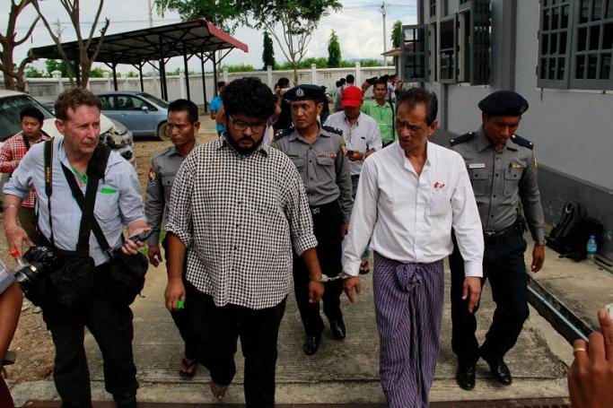 Aung Naing Soe (L), Myanmar freelance journalist and interpreter, and his driver Hla Tin(R), arrives at Zabu Thiri court during their first trial in Nay Pyi Taw on 10 November, 2017. Photo: Min Min/Mizzima
