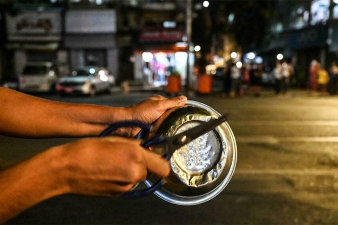 (File) Since the coup, cities and towns across Myanmar have periodically rung with the sounds of banging pots and pans. Photo: AFP