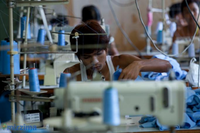 Myanmar migrants work in a garment factory in Mae Sot, Thailand. Photo: Hong Sar/Mizzima
