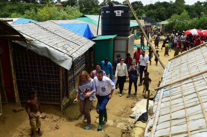 President of the International Committee of the Red Cross (ICRC) Peter Maurer (C) visits the Chakmarkul refugee camp in Teknaf on July 1, 2018. Photo: Munir Uz Zaman/AFP
