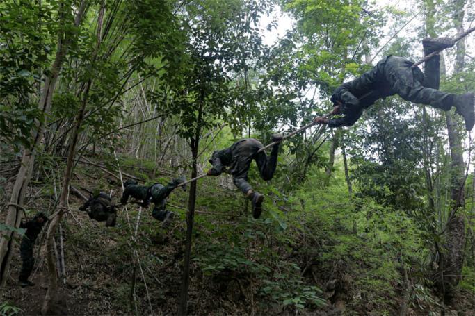 This undated photo taken in May 2021 shows anti-coup activists undergo basic military training at the camp of Karen National Union (KNU), an ethnic rebel group in Karen State after people fled major Myanmar cities due to military crackdown and sought refuge in rebel territories. Photo: AFP