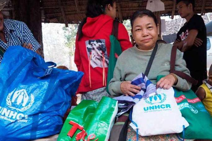 Ma Thay, a refugee from Ban Mae La camp, receives non-food items(NFIs) before a departure to Myanmar during the voluntary repatriation, 20 February 2019. Photo: UNHCR/Chattriyaporn Singchum