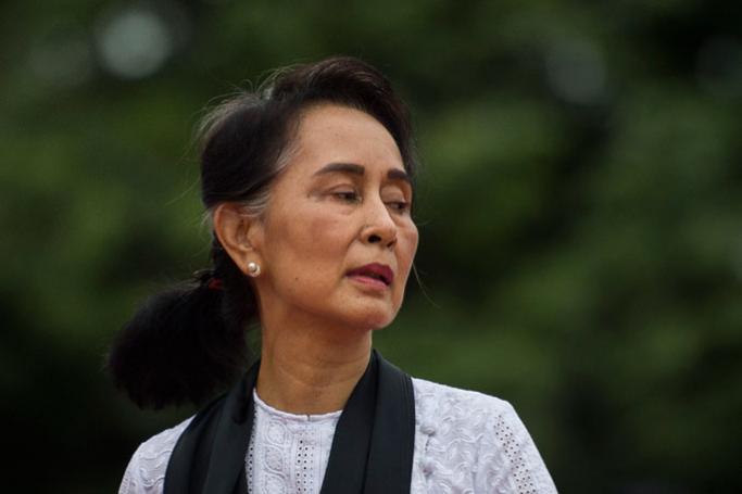 (FILES) This file photo taken on July 19, 2018 shows Myanmar State Counsellor Aung San Suu Kyi attending ceremony for her late father during the 71th anniversary of Martyrs' Day in Yangon. Amnesty International on November 13 stripped Aung San Suu Kyi of its highest honour over the de facto Myanmar leader's "indifference" to the atrocities committed by the military against Rohingya Muslims. Photo: Ye Aung Thu/AFP