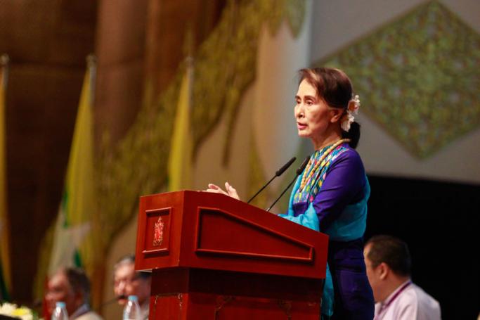 Myanmar's state counselor Aung San Suu Kyi delivers a speech during a meeting with the country's businessmen at the Myanmar International Convention Center (MICC), in Naypyitaw on 27 August 2018. Photo: Min Min/Mizzima