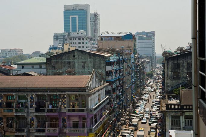 Old and new apartment blocks across the Yangon skyline. Photo: Romeo Gacad/AFP
