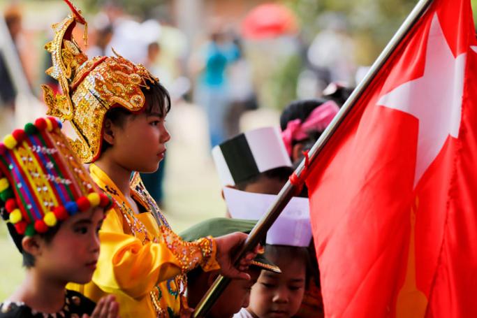 Children wear Myanmar traditional dress as they take part during the National League for Democracy (NLD) party's Union Day ceremony in Yangon, Myanmar, 12 February 2015. Photo: Lynn Bo Bo/EPA
