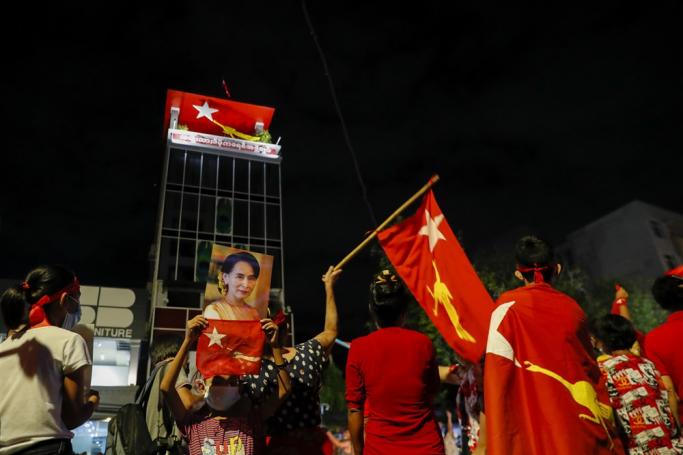 (File) Supporters of National League for Democracy (NLD) party, led by Myanmar State Counsellor Aung San Suu Kyi, celebrate in front of the party headquarters on the evening of general elections day in Yangon, Myanmar, 08 November 2020. Photo: EPA