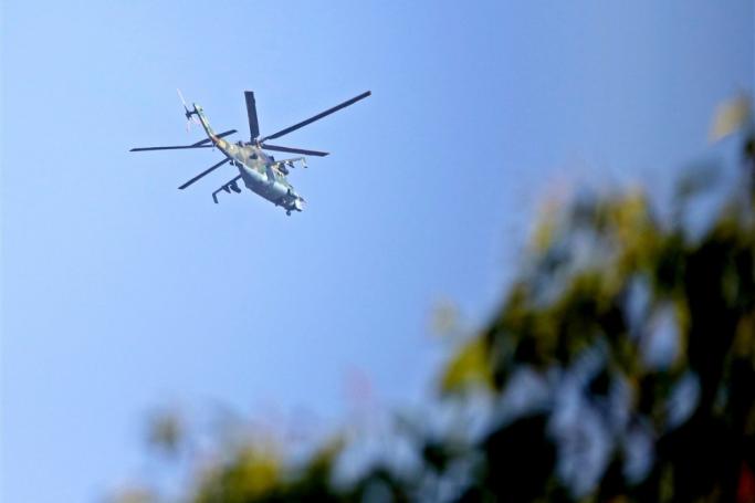 (File) A military helicopter flies in Naypyitaw, Myanmar, 01 February 2021. Photo: EPA