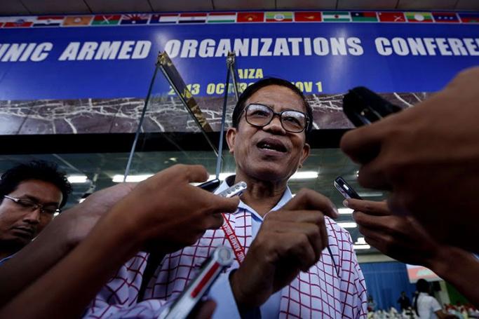 Nai Han Tha (C), chairman of the New Mon State Party (NMSP), talks to media at the end of the first day of Ethnic Armed Organizations Conference in Laiza, Kachin State, Myanmar, 30 October 2013. Photo: Nyein Chan Naing/EPA
