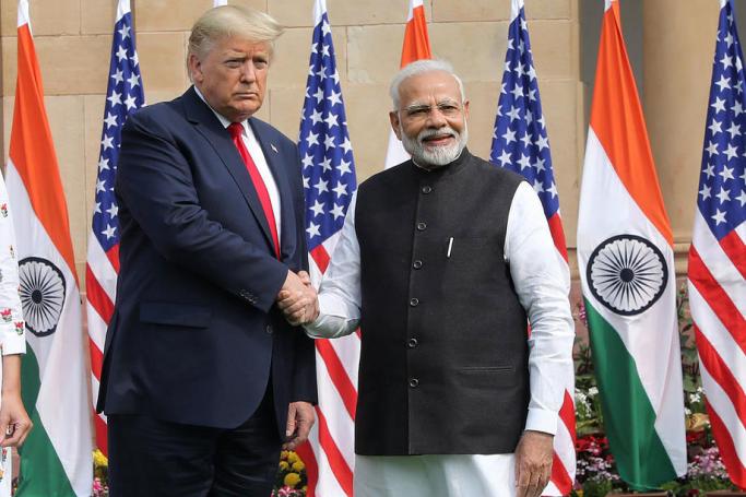 Indian Prime Minister Narendra Modi (R) and US President Donald J. Trump (L) shake hands prior to a meeting at Hyderabad House in New Delhi, India, 25 February 2020. Photo: EPA