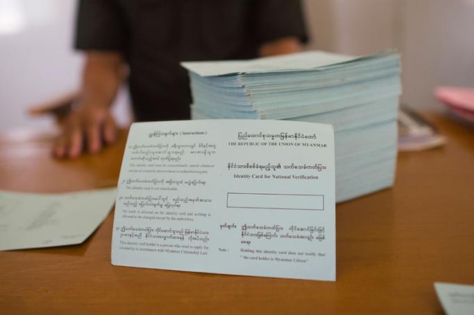 Immigration officials preparing the National Verification Card at the Ngakhura processing camp for Rohingya Muslims in Maungdaw district, Myanmar's Rakhine state near the Bangladesh border. Photo: Ye Aung Thu/AFP
