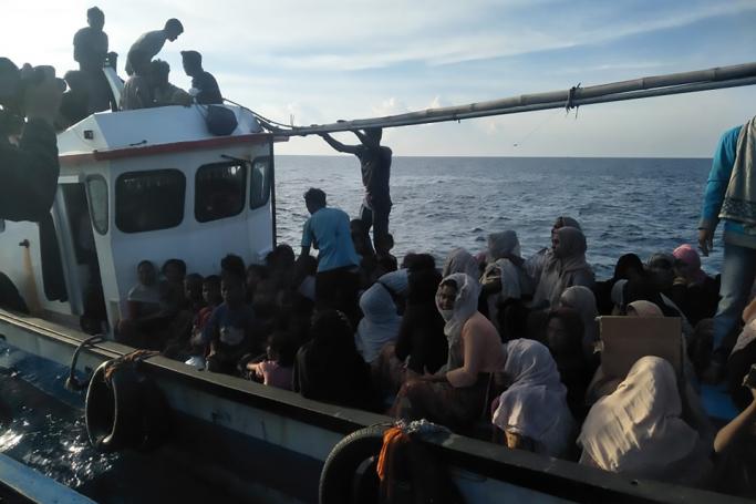 This handout picture taken and released on June 24, 2020 by the Indonesian Navy shows a vessel carrying Rohingya people some eight kilometres (five miles) offshore in the Malacca strait between Indonesia and neighbouring Malaysia. Photo: AFP