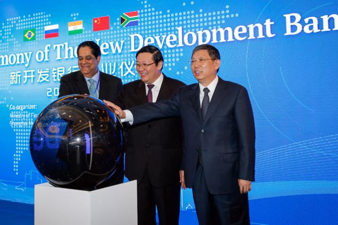 Flashback - (L-R) The President of the New Development Bank (NDB), Kundapur Vaman Kamath of India, China's Finance Minister Lou Jiwei and Shanghai's mayor Yang Xiong, attend the opening ceremony of the NDB in Shanghai, China 21 July 2015. Photo: EPA

