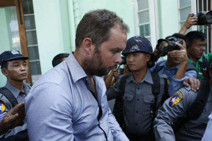 Flashback - New Zealand citizen Philip Blackwood (C) is escorted by Myanmar policemen after his hearing at the court in Yangon, Myanmar, 02 January 2015. Photo: Lynn Bo Bo/EPA. Mr Blackwood has been released and has returned to New Zealand.

