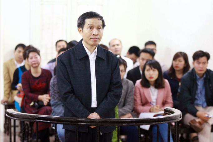 Nguyen Huu Vinh, known as blogger Anh Ba Sam, stands during his trial in Hanoi, Vietnam 23 March 2016. Photo: EPA
