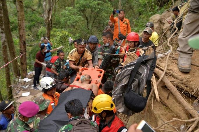Accidents frequently happen at abandoned mines in Indonesia when locals enter looking for rich pickings. At least 16 people died in this accident in north Sulawesi in early 2019 (AFP Photo/UNGKE PEPOTOH)