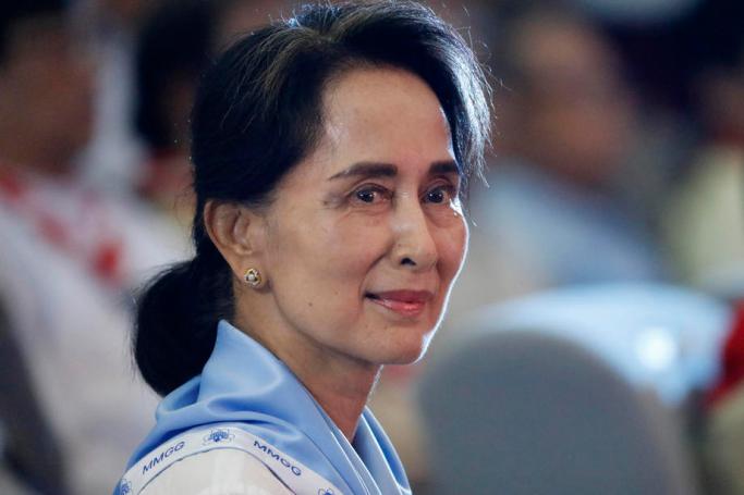 (FILE) - Myanmar State Counselor Aung San Suu Kyi wearing a Girl Scout uniform looks on during her swearing-in ceremony as chief of Myanmar scouts at the Yangon University Diamond Jubilee Hall in Yangon, Myanmar, 20 July 2019. Photo: Nyein Chan Naing/EPA