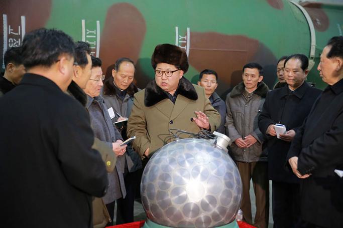(FILE) An undated picture provided by the official Korean Central News Agency (KCNA) on 09 March 2016 shows North Korean leader Kim Jong-un (C), talking with scientists and technicians involved in research of nuclear weapons, at an undisclosed location, North Korea. Photo: KCNA/EPA
