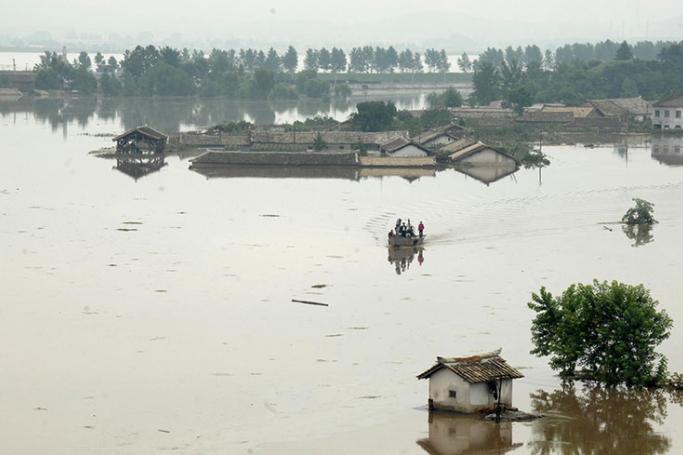 (FILE) A file photograph released by North Korea's State news agency Korean Central News Agency (KCNA) on 30 July 2012 of houses submerged by flood water in Anju City on the west coast of North Korea, on 29 July 2012. Photo: KCNA/EPA

