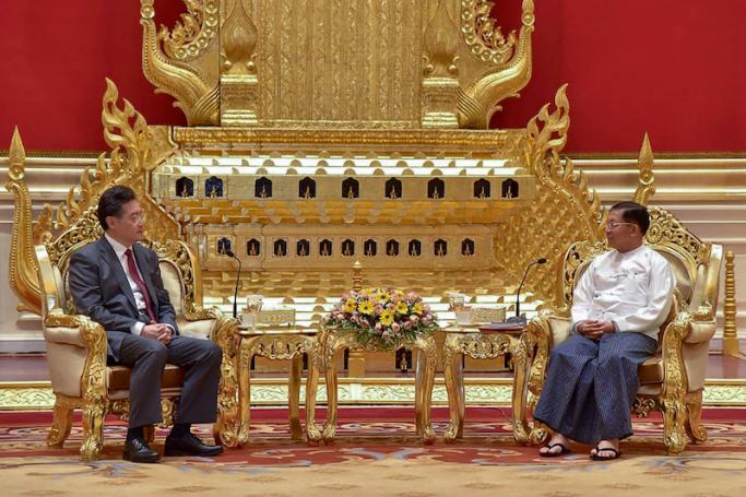 This handout photograph taken and released on May 2, 2023, by the Myanmar Military Information Team shows Myanmar junta chief Min Aung Hlaing (R) and Chinese Foreign Minister Qin Gang during their meeting in Nay Pyi Taw. Photo: AFP