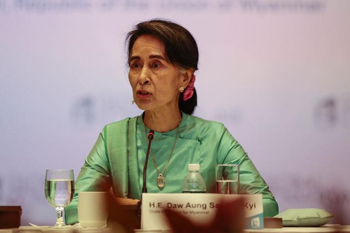 Myanmar Foreign Minister and State Counsellor Aung San Suu Kyi speaks to attendees at the IE Singapore Global Conversations seminar at the Shangri-La Hotel in Singapore, 30 November 2016. Photo: EPA
