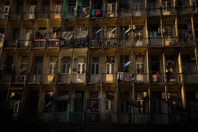 The facade of an old housing block in downtown Yangon. Photo: Ye Aung Thu/AFP
