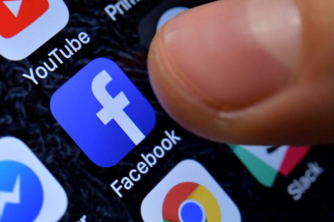 A close-up image showing the Facebook app on an iPhone. Photo: EPA
