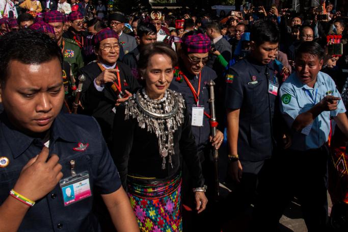 (File) Myanmar State Counsellor Aung San Suu Kyi (C) attends the 71st Kachin State day ceremony in Myitkyina, upper Myanmar on January 10, 2019. Photo: ZAU RING HPRA / AFP