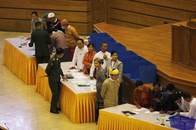 Members of parliament cast their votes during the Assembly of the Union (Pyidaungsu Hluttaw) at the parliament building in Nay Pyi Taw on 11 March 2020. Photo: Than Htike Aung/Mizzima