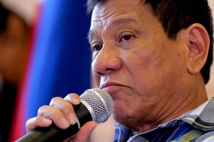 Presumptive president-elect of the Philippines Rodrigo Duterte speaks during a press conference before he meets well-wishers in Davao City, southern Philippines, 16 May 2016. On 15 May 2016, Photo: Ritchie B. Tongo/EPA
