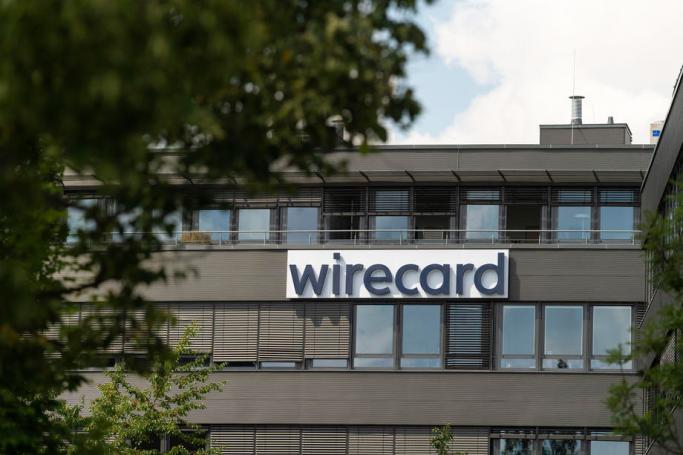Company signage of the financial services and payment processor company Wirecard at the company headquarters building in Aschheim near Munich, Bavaria, Germany, 23 June 2020. Photo: EPA