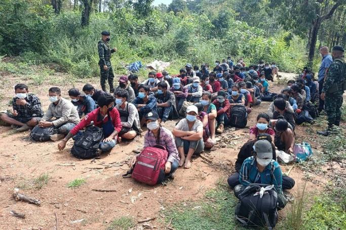 (File) In this handout photo from the Royal Thai Army taken and released on November 1, 2021, Myanmar migrants are pictured after being apprehended by Thai military personnel in Kanchanaburi province, bordering Myanmar. Photo: AFP