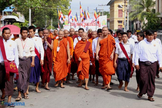 Buddhist monks and supporters participate during a rally to mark the victory of the passing of ‘Race and Religion Protection Laws,’ in Mandalay on 21 September 2015. Photo: Bo Bo/Mizzima
