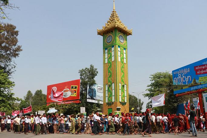Ethnic Rakhine protesters take part in a demonstration against a government push to speed up the citizenship verification process for the stateless Rohingya minority in Sittwe township, Rakhine state, on March 19, 2017. Photo: Khine Htoo Mrat/AFP
