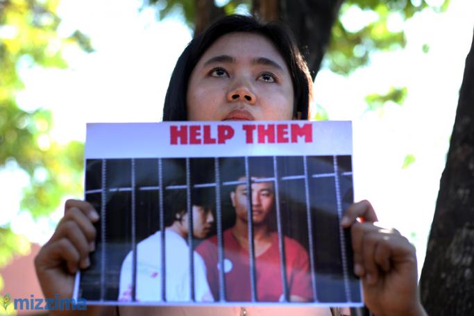 A protester stands outside the Thai embassy in Yangon. Photo: Thet Ko/Mizzima
