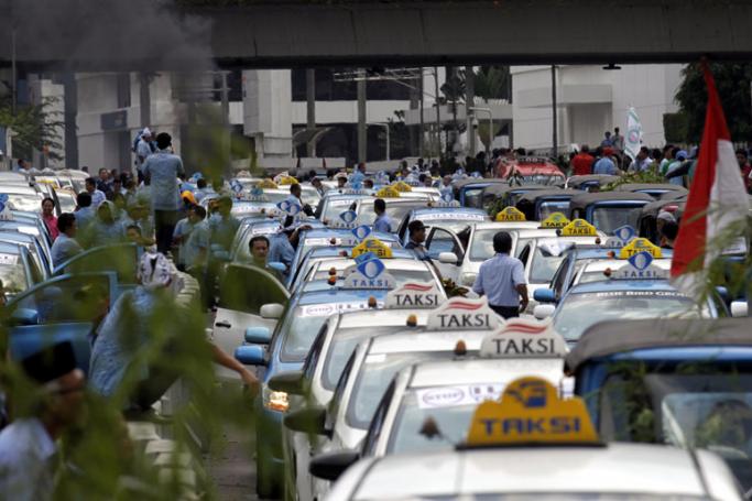 Indonesian drivers stage violent anti-Uber protest  Mizzima 