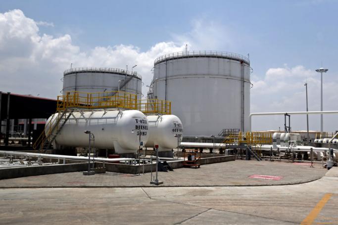 A view of oil storage tanks inside the Puma Energy Asia Sun petroleum products terminal in Thilawa port, Yangon, Myanmar. Photo: Nyein Chan Naing/EPA