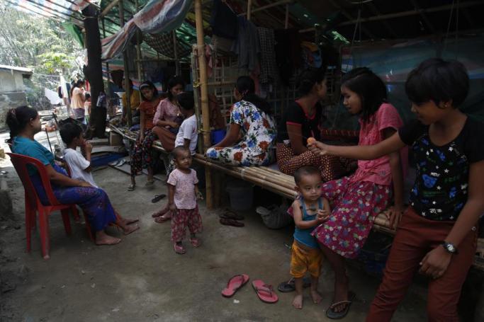 Rakhine people who fled from an area struck by conflict between the Myanmar military and Arakan Army, gather at the Nan Shwe Gu Monastery's temporary camps in Sittwe, Rakhine State, Myanmar, 15 March 2020. Photo: Nyunt Win/EPA