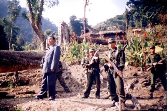 Khaplang at his den flanked by his bodyguards. Photo: samir kar purkayastha/PCDN
