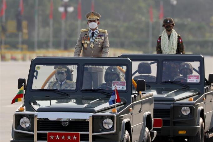 (File) Myanmar military Commander-in-Chief Senior General Min Aung Hlaing (L) participates in a parade during the 77th Armed Forces Day in Naypyidaw, Myanmar, 27 March 2022. Photo: EPA
