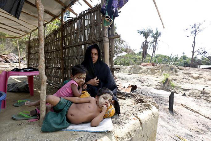 A poor Rohingya Muslim family in their primitive shelter in Pwint Phyu Chaung village, Maungdaw town near the Bangladesh-Myanmar border, Rakhine State, western Myanmar, 30 March 2017. Photo: Nyein Chan Naing/EPA
